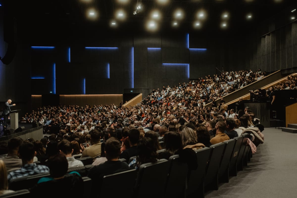Modern conference centre with stage and seating